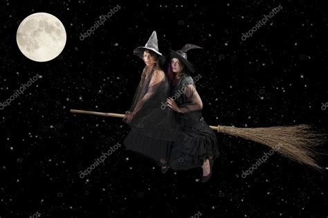 Giant flying witch with broom